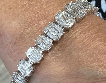 18k Invisibly set Baguette Cut Diamond Bracelet